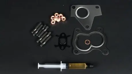 Комплект прокладок турбины DACIA LOGAN I(LS_)05-; RENAULT TWINGO II (CN0) 07-14; NISSAN MICRA III (K12) 03-10 AJUSA JTC11273