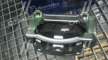 Тормозной суппорт MANDO EX581102B700 (фото 1)